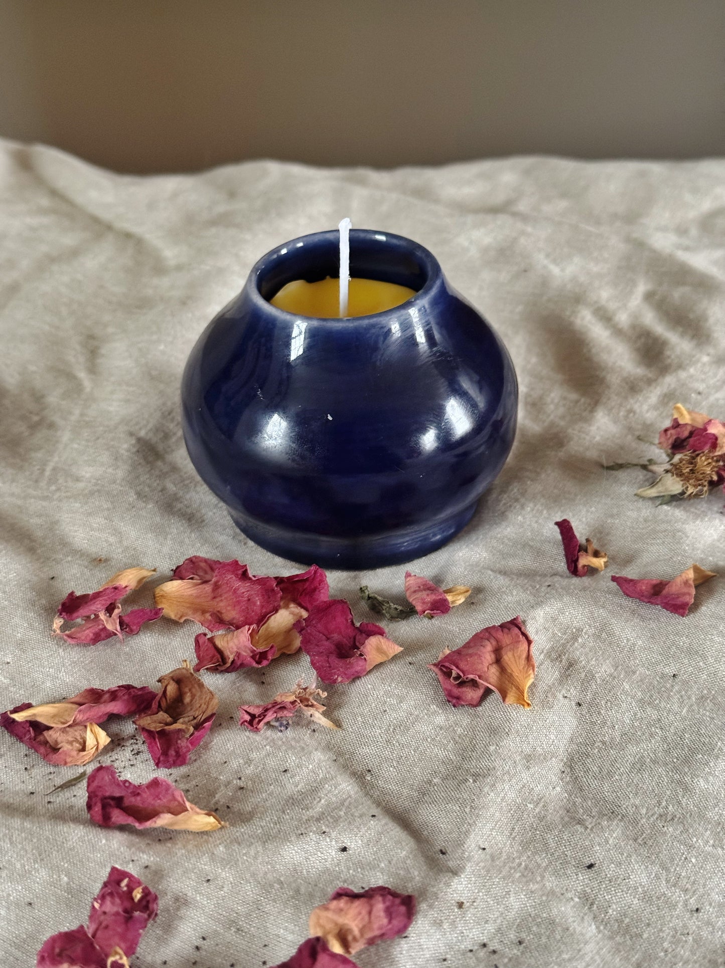 Blue pottery beeswax candle